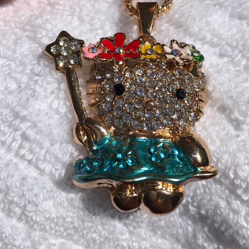 Betsey Johnson Kitty with star wand and flowers.